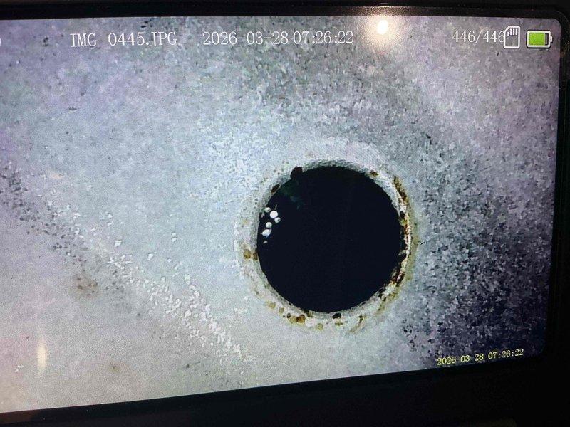 Responded to service call for second opinion on previously condemned furnace with reported cracked heat exchanger. Performed thorough inspection of heat exchanger using borescope camera to examine internal surfaces and combustion chamber areas. Visual inspection revealed areas of concern with discoloration and staining patterns around heat exchanger openings consistent with potential breach points, though conclusive evidence of active cracking was not definitively established during examination. Based on inspection findings and safety considerations regarding heat exchanger integrity, recommended furnace replacement to prevent risk of carbon monoxide exposure and ensure safe operation of heating system.