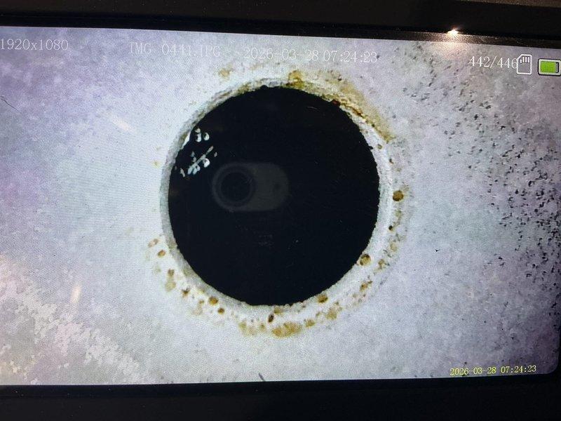 Responded to service call for second opinion on previously condemned furnace with reported cracked heat exchanger. Performed thorough inspection of heat exchanger using borescope camera to examine internal surfaces and combustion chamber areas. Visual inspection revealed areas of concern with discoloration and staining patterns around heat exchanger openings consistent with potential breach points, though conclusive evidence of active cracking was not definitively established during examination. Based on inspection findings and safety considerations regarding heat exchanger integrity, recommended furnace replacement to prevent risk of carbon monoxide exposure and ensure safe operation of heating system.