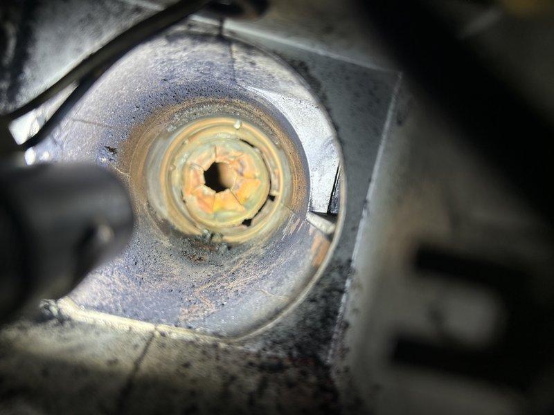 Responded to no heat call on oil-fired furnace experiencing short cycling and heavy soot accumulation. Upon inspection, discovered broken flame spreader had fallen in front of the nozzle, causing incomplete combustion and extensive sooting throughout the combustion chamber and heat exchanger. Also identified cracked pump solenoid valve requiring replacement. Documented equipment condition with photographs showing internal component damage and soot buildup. Compiled comprehensive parts list for pricing and submitted to parts department for quote on necessary repairs. Due to age of system and extent of repairs needed, coordinated with advisor to provide customer with comparison pricing for oil-to-gas conversion options as alternative solution to repair.