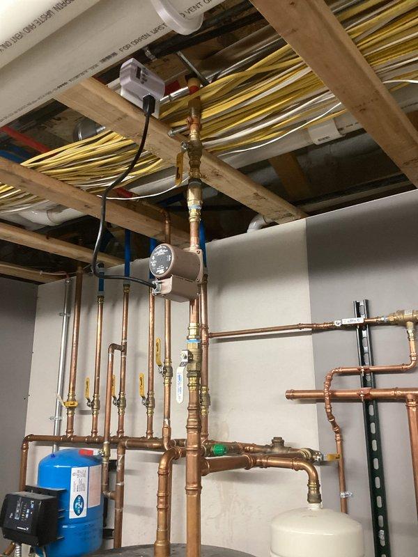 Completed installation of new hot water recirculation pump, mixing valve, and check valve on residential hydronic heating system. Replaced failed components to restore proper hot water temperature control and circulation throughout the home, preventing scalding hazards and ensuring consistent water temperature delivery at fixtures. All copper piping connections were properly soldered, system was pressure tested for leaks, and equipment was verified operational before completion.