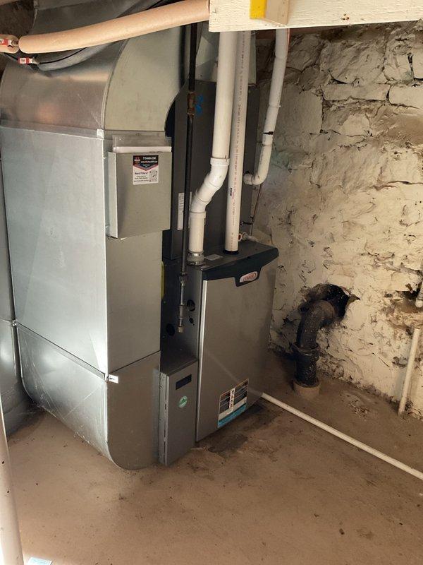 Completed comprehensive HFR furnace and air conditioning maintenance inspection on 4-year-old system. Found furnace operating properly with recently replaced filter and no issues detected. Due to seasonal conditions, proceeded with AC coil cleaning which revealed significant debris accumulation that was thoroughly removed to restore proper airflow and system efficiency.
