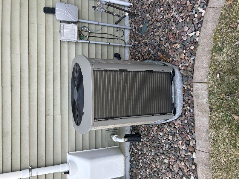 Completed comprehensive AC tune-up on recently installed system from September. Performed full system operational testing, verified air filter condition, confirmed drain line was clear and flowing properly, inspected and cleaned outdoor condenser unit, and identified and secured a loose wire connection. All components tested and verified operating within normal parameters upon completion.