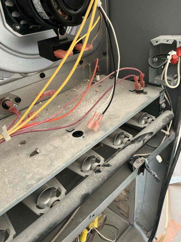 Responded to no heat call on temporary furnace in new construction home. Found inducer motor wires disconnected following recent inducer replacement performed last week. Reconnected and secured inducer motor wiring, restoring proper electrical connection. Unit tested and confirmed operational with normal heating function restored.