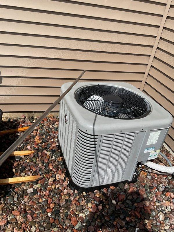 Completed annual AC maintenance tune-up on residential air conditioning system as part of membership agreement. During inspection, discovered one speed connector had disconnected from the capacitor and successfully reconnected it. Identified condenser fan blade wobble and noted unusual ductwork configuration throughout the home. Requested quote for replacement condenser fan blade to address the wobble issue and ensure optimal system performance.
