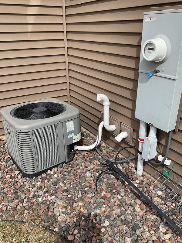 Completed annual AC maintenance tune-up on residential air conditioning system as part of membership agreement. During inspection, discovered one speed connector had disconnected from the capacitor and successfully reconnected it. Identified condenser fan blade wobble and noted unusual ductwork configuration throughout the home. Requested quote for replacement condenser fan blade to address the wobble issue and ensure optimal system performance.