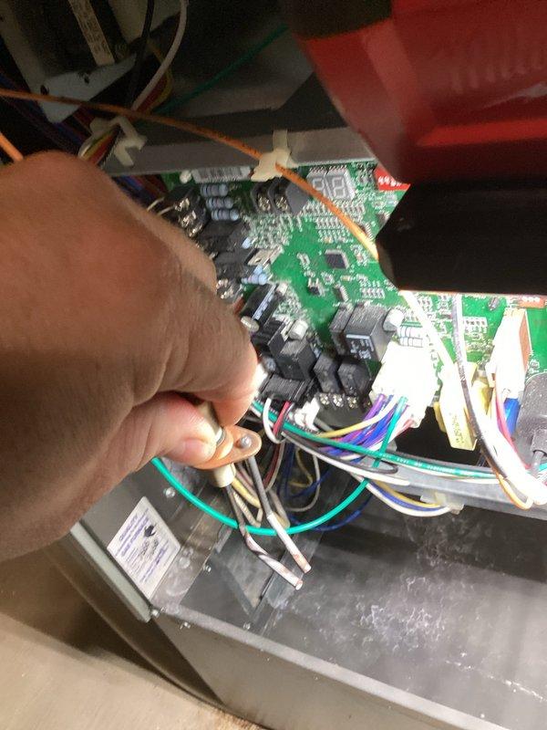 # No Heat Call - Rheem Gas Furnace

Responded to a no heat service call on a Rheem gas furnace (Model: RGPB-10EBRMR, manufactured 05/2011). Customer reported the unit would run for approximately 30 seconds before shutting down. Upon arrival, confirmed the furnace was attempting to operate but displaying a 46 error code, indicating a pressure switch fault.

Performed diagnostic testing on the pressure switch circuit and identified the low heat pressure switch was not closing properly, preventing the unit from completing its ignition sequence. Conducted comprehensive system inspection including flame sensor, hot surface ignitor, heat exchanger integrity, and control board operation to rule out additional failure points. All other components tested within normal parameters.

Implemented a temporary repair to restore heat to the residence while awaiting replacement parts. Ordered the necessary pressure switch component for permanent repair. System is operational on temporary repair; follow
