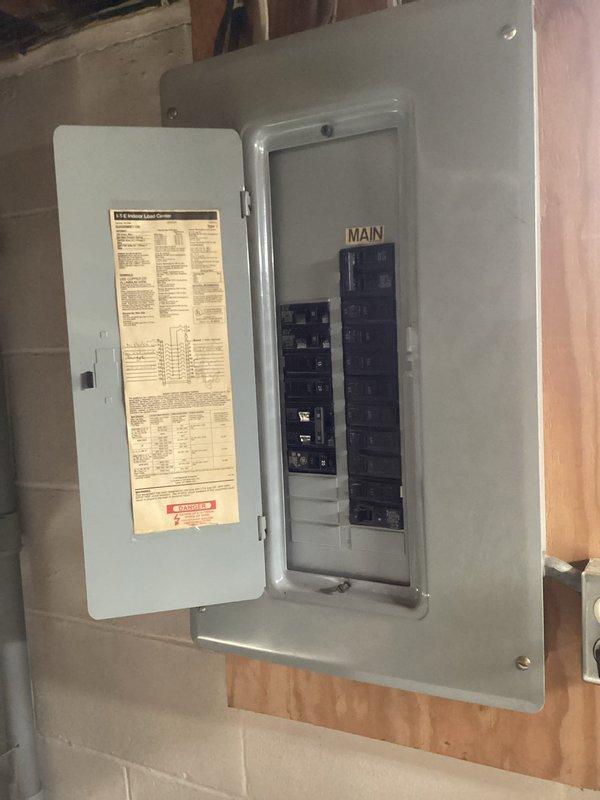 Performed comprehensive furnace tune-up on older General Electric unit. Replaced dirty air filter with customer-supplied unit. Inspection revealed clean burners but dirty blower assembly and weak capacitor reading 3uf (rated 5uf). Conducted thorough heat exchanger inspection with photographic documentation, identifying areas of concern but no active compromises. Ran system for 10 minutes to verify operation; unit functioned properly with elevated supply temperatures likely due to blower contamination. Discussed equipment age, overall condition, and heat exchanger concerns with homeowner and family, providing visual documentation. Recommended obtaining estimates for blower motor/capacitor repair and full system replacement options for comparison.