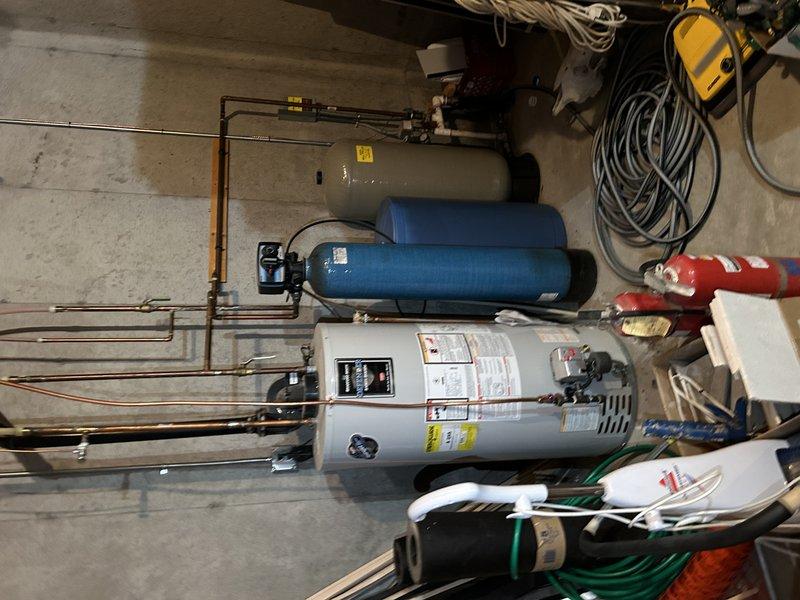 Responded to service call for NTI boiler providing basement in-floor heat that was not maintaining proper temperature, heating only to 67 degrees despite being set to 85 degrees. Diagnosed system and found it was low on water due to a malfunctioning backflow preventer that was preventing water from entering the system. Disconnected the backflow prevention device and performed testing to confirm proper water flow and verify the backflow preventer itself was the source of the obstruction. Ordered replacement part to restore system to proper operation and ensure consistent in-floor heating performance.