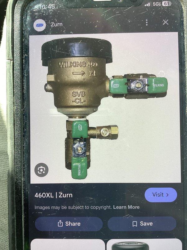 Completed annual cross-control backflow prevention inspection and testing on two devices: a Wilkins 975XL RPZ valve (serial number ABB08849) located in Washroom #2 and a Wilkins 460XL SVB valve (serial number 461483) located at the freezer wall. Both assemblies passed testing with acceptable differential pressure readings recorded for check valves and relief valve components. Additionally, replaced a malfunctioning foot-activated mixing valve at the hand wash sink to restore proper operation.