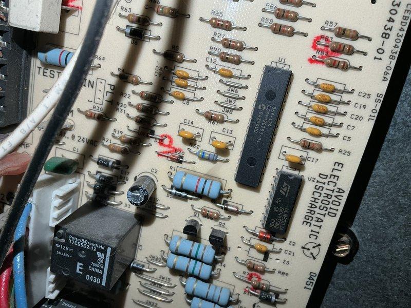 Responded to no heat call on 21-year-old natural gas furnace unable to maintain temperature above 60 degrees despite thermostat set to 70. Upon inspection, identified multiple critical system failures including failed ignitor, failing flame sensor, control board with visible burn marks around resistors, blower motor leaking oil and not turning, and heat exchanger displaying severe temperature stress points with areas near cracking. Documented equipment condition with photographs showing control board damage and heat exchanger deterioration. Due to the age of the unit and extent of multiple component failures presenting safety concerns, recommended full furnace replacement and scheduled same-day estimate for new system installation.