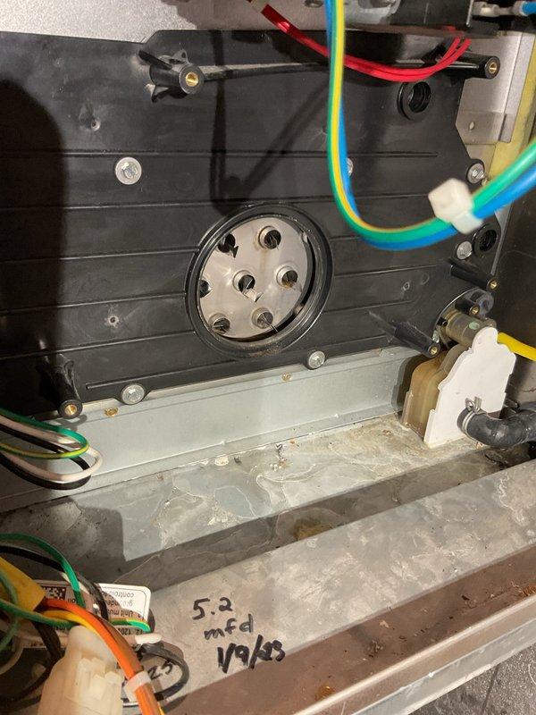 Responded to no heat call on residential HVAC system over 10 years old. Upon arrival, confirmed unit was not blowing air. Diagnosed inducer motor with locked bearing causing system failure. Removed inducer assembly and inspected for debris; confirmed bearing failure as root cause. Replaced inducer motor and reassembled draft system. While unit was open, performed heat exchanger inspection to ensure safe operation and cleaned flame sensor to optimize ignition performance. Tested draft system operation and verified proper airflow. System restored to full heating operation.