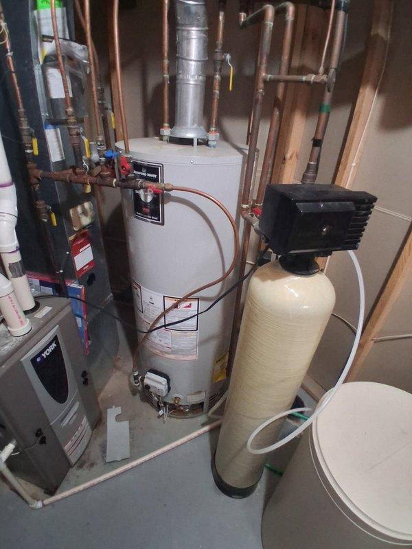 Responded to a no hot water call for a second opinion after another company diagnosed the unit as leaking internally. Upon arrival, confirmed the water heater was unable to maintain pilot flame and verified the unit required replacement rather than repair. Customer accepted bid for new water heater installation to restore hot water service to the residence.