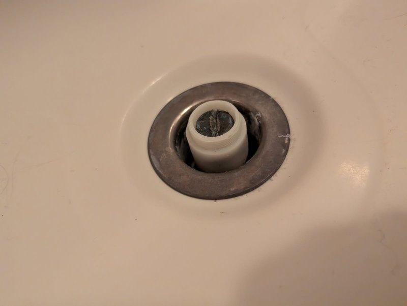 Responded to upstairs bathroom plumbing issues involving corroded fixtures. Replaced broken toilet flush handle that had corroded and separated from the flush arm mechanism. Removed and replaced corroded tub waste assembly and trim piece that had deteriorated due to age and mineral buildup. Recommended toilet replacement due to overall condition, but proceeded with handle replacement per owner's preference.
