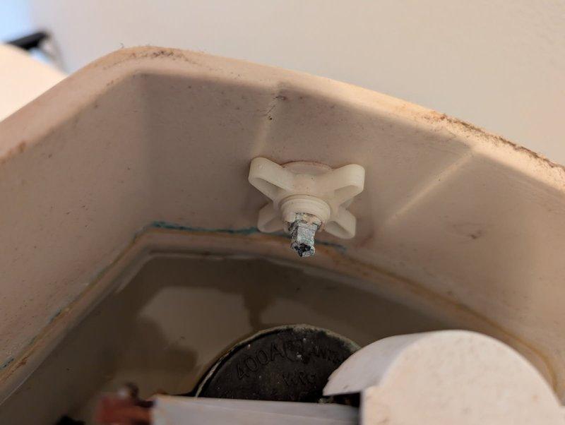 Responded to upstairs bathroom plumbing issues involving corroded fixtures. Replaced broken toilet flush handle that had corroded and separated from the flush arm mechanism. Removed and replaced corroded tub waste assembly and trim piece that had deteriorated due to age and mineral buildup. Recommended toilet replacement due to overall condition, but proceeded with handle replacement per owner's preference.