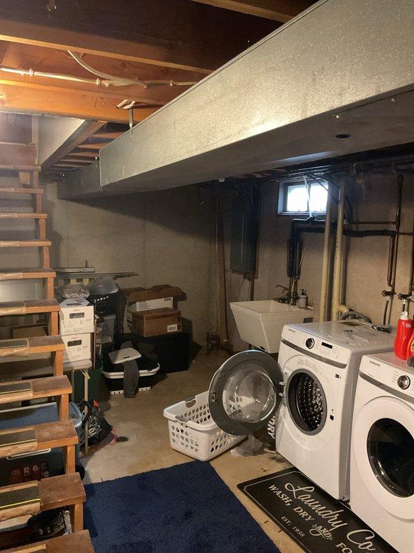 Replaced defective combustion draft inducer assembly on residential furnace unit located in basement mechanical room. Removed failed inducer motor, installed new assembly, and verified proper operation of pressure switch connections and PVC venting system. Conducted complete system test upon completion to ensure proper draft operation, ignition sequence, and overall furnace functionality.