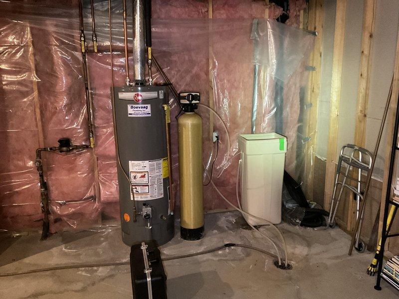 Responded to service call for malfunctioning water softener with excessive water accumulation in the tank. Upon inspection, determined the unit was inoperative and beyond economical repair. Assessed the existing water treatment system configuration in the basement utility area, including connections to the water heater and plumbing infrastructure. Provided estimate for complete water softener replacement system, which was approved by the customer with downpayment processed for scheduled installation.