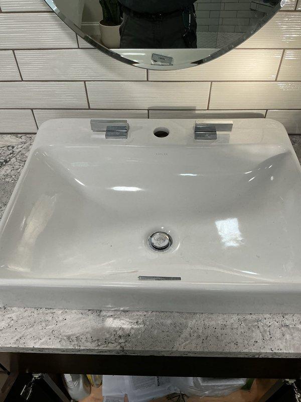 Installed two Moen widespread lavatory faucets in the master bathroom, mounting the fixtures to undermount sinks with granite countertops and ensuring proper alignment with existing plumbing connections. Repaired a malfunctioning faucet in the main bathroom by replacing a missing O-ring, restoring proper function and eliminating leaks. All installations were tested for proper water flow and drainage, with chrome finishes matching the contemporary bathroom aesthetic.