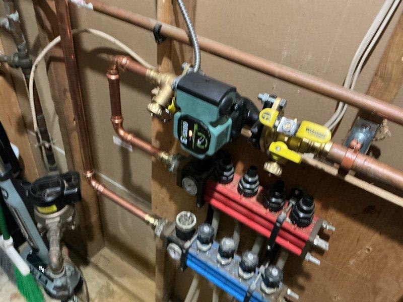 Responded to service call for high-pitched whistling noise occurring when basement zone activated on recently installed boiler system. Diagnosed issue as excessive flow velocity through zone valve caused by circulator pump operating at high speed setting. Adjusted circulator pump speed from high to medium, which eliminated the whistling noise. Monitored system pressure and temperature readings following adjustment to verify proper operation and confirm no adverse effects from speed change. System operating normally with all zones functioning properly and no noise issues present after modification.