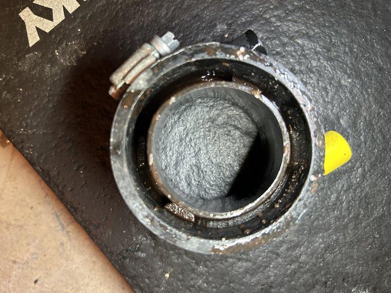 Responded to no heat call on 10-year-old York furnace that was blowing cold air and failing to reach setpoint. Yellow flashing LED indicated dirty flame sensor condition. Upon inspection, found inducer assembly completely filled with water due to plugged condensate drain line. Cleared blockage from drain line and removed standing water from inducer housing. Cycled system through complete heating operation to verify proper function. Performed visual inspection of heat exchanger for signs of deterioration or failure—no issues found. All system components now operating within normal parameters with proper condensate drainage restored. Enrolled customer in preventative maintenance plan to avoid future service issues.