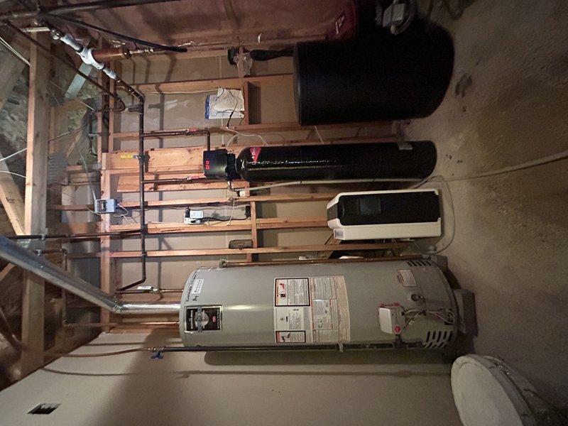 Responded to no heat call on 10-year-old York furnace that was blowing cold air and failing to reach setpoint. Yellow flashing LED indicated dirty flame sensor condition. Upon inspection, found inducer assembly completely filled with water due to plugged condensate drain line. Cleared blockage from drain line and removed standing water from inducer housing. Cycled system through complete heating operation to verify proper function. Performed visual inspection of heat exchanger for signs of deterioration or failure—no issues found. All system components now operating within normal parameters with proper condensate drainage restored. Enrolled customer in preventative maintenance plan to avoid future service issues.