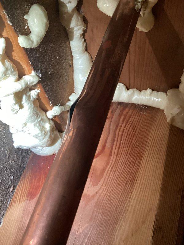 Responded to emergency call for burst lawn faucet that caused water intrusion into basement. Upon inspection, confirmed freeze damage to exterior hose bib requiring full replacement. Installed new frost-proof sillcock with copper supply line connections, ensuring proper pitch for drainage and securing all solder joints. Homeowner elected to defer completion pending coordination with home warranty company for reimbursement authorization.