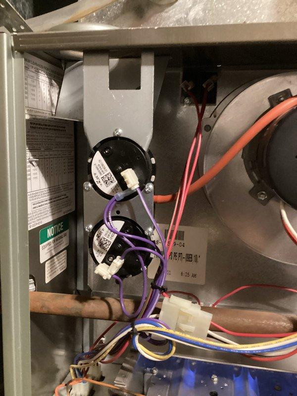 Returned to property to replace a defective dual pressure switch on the furnace. Removed the faulty pressure switch assembly and installed a new dual pressure switch unit. After installation, cycled the furnace through multiple heating cycles to verify proper ignition sequence and burner operation. Confirmed all pressure switch connections were secure and system returned to normal operation with no fault codes present.