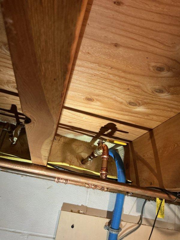 Responded to water leak at exterior hose bib that was previously replaced in 2024. Upon inspection, discovered the outdoor faucet had frozen and broken during winter due to improper back-pitch installation. Removed failed exterior faucet and installed new replacement unit with proper forward pitch to ensure adequate drainage and prevent future freeze damage. Verified all connections were secure and tested operation to confirm leak was eliminated.