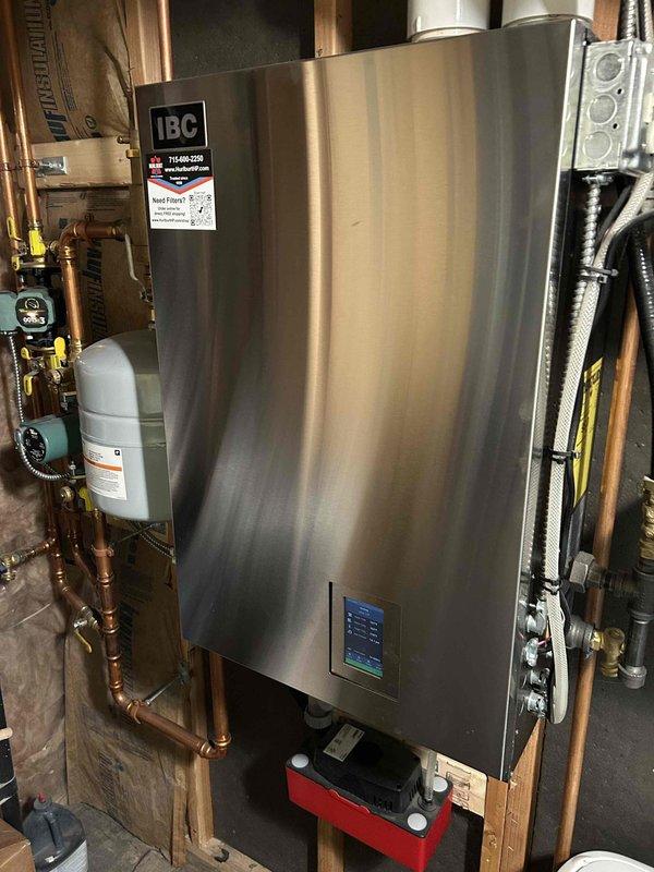 Completed comprehensive boiler tune-up on IBC unit previously installed in October 2023. Removed and thoroughly cleaned flame sensor and routine maintenance components, performed detailed inspection of heat exchanger, and added cleaning tablet to condensate pump. Ran full system diagnostics and operational testing with all equipment functioning properly and within manufacturer specifications.