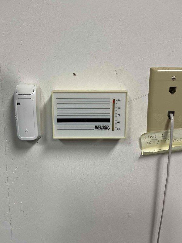 Responded to no-heat call for boiler serving in-floor radiant heating system in separate outbuilding. Diagnosed loss of power to INFL00R thermostat traced to failed circulating pump control. Provided estimate for pump replacement to restore system operation.
