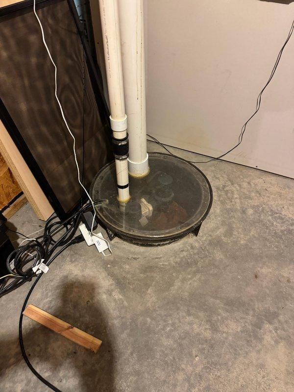 Responded to a non-functioning sump pump in the basement. Upon inspection, determined the existing sump pump had failed and was no longer operational. Removed the defective pump unit from the sump basin and installed a new replacement sump pump. Verified proper electrical connections and tested the new pump for correct operation and discharge through the existing PVC drainage piping system. System restored to full working order.