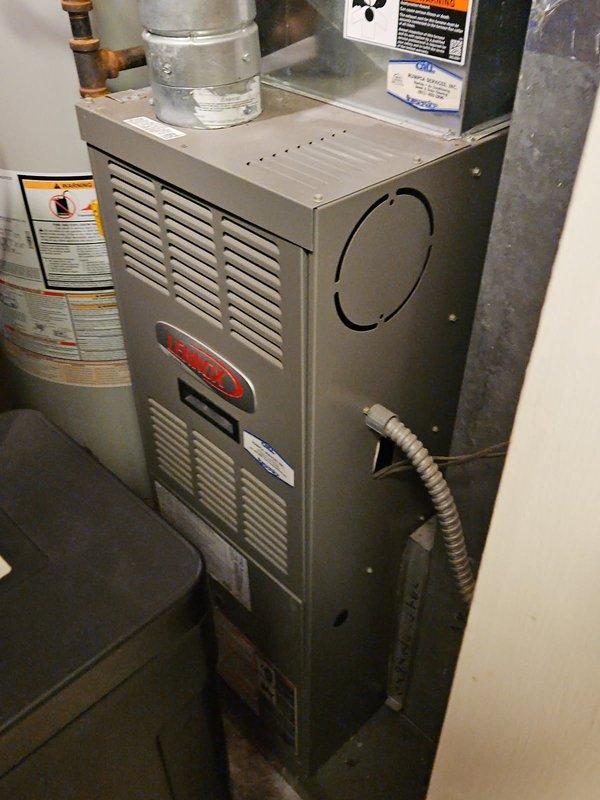 Responded to no heat call on 10+ year old furnace not maintaining thermostat setpoint. Upon arrival, thermostat displayed 61°F with heat setting at 65°F. Cycled furnace and observed burners igniting but system shutting down prematurely. Performed diagnostic testing on inducer motor, pressure switch, igniter, and flame sensor. Determined flame sensor was failing to generate adequate signal for proper flame rectification. Replaced defective flame sensor with new component. Inspected burners and heat exchanger for proper operation and clearances. Verified control board and blower motor functionality. Cycled system multiple times from thermostat to confirm proper ignition sequence, flame proving, and heating cycle completion. System restored to normal operation with adequate heat output.