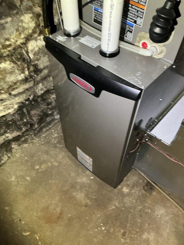 Completed furnace maintenance inspection on 8-month-old Lennox system as scheduled annual HVAC maintenance included with membership. Due to outdoor temperature of 31 degrees, service was converted from cooling tune-up to heating system inspection. Performed comprehensive furnace maintenance including filter inspection and system operational check. Identified non-functional humidifier during inspection. Recommended and completed humidifier replacement with upgraded unit to restore proper humidity control functionality to the system.