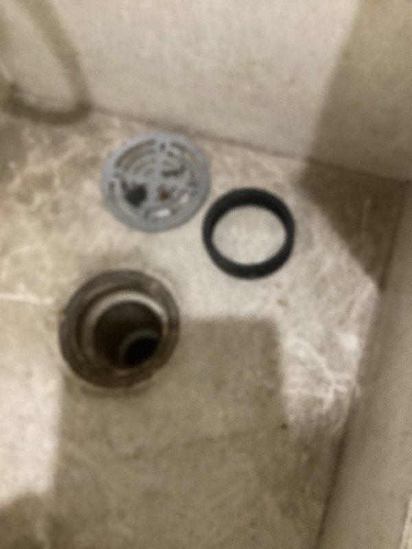 Responded to water leak caused by mop sink drain failure in kitchen area above basement. Upon inspection, discovered the push gasket had pulled out of the sink drain assembly due to inadequate support of the two-inch drain pipe from below. Reinstalled drain gasket, secured proper support for the two-inch pipe from underneath, and performed leak test to verify repair integrity.