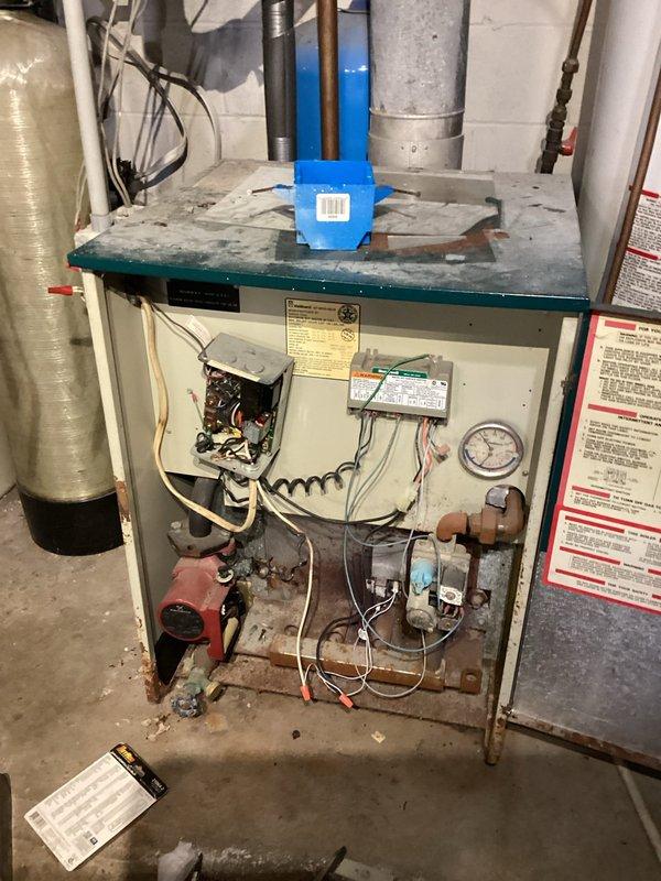 Responded to no-heat call on 10+ year old boiler system. Upon inspection, determined igniter had failed and was preventing system from firing. Exact replacement igniter not available on truck, so fabricated temporary solution using compatible igniter component. Successfully installed makeshift igniter safely and verified proper operation and system functionality. Boiler restored to full working condition and producing heat as designed. Noted customer has multiple zone valves requiring replacement but customer has sourced parts independently for future installation.
