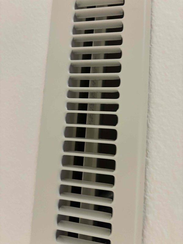 Completed comprehensive duct cleaning service for 18 openings including both supply and return vents throughout the residence. Removed accumulated lint and debris from ductwork system, with moderate buildup observed during cleaning process. Replaced humidifier pad #35 and cleaned all vent covers to restore optimal airflow and system efficiency.