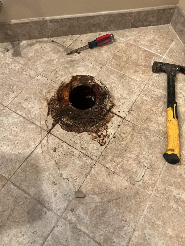 Responded to main bathroom toilet that continued running despite homeowner replacing all internal components. Upon inspection, discovered toilet was continuously leaking water into the bowl due to defective fixture that could not be repaired. Removed and disposed of faulty toilet unit along with corroded floor flange hardware. Installed new elongated standard height toilet with all necessary components including wax ring seal and supply line connection. Tested new installation for proper flush operation and verified no leaks present.