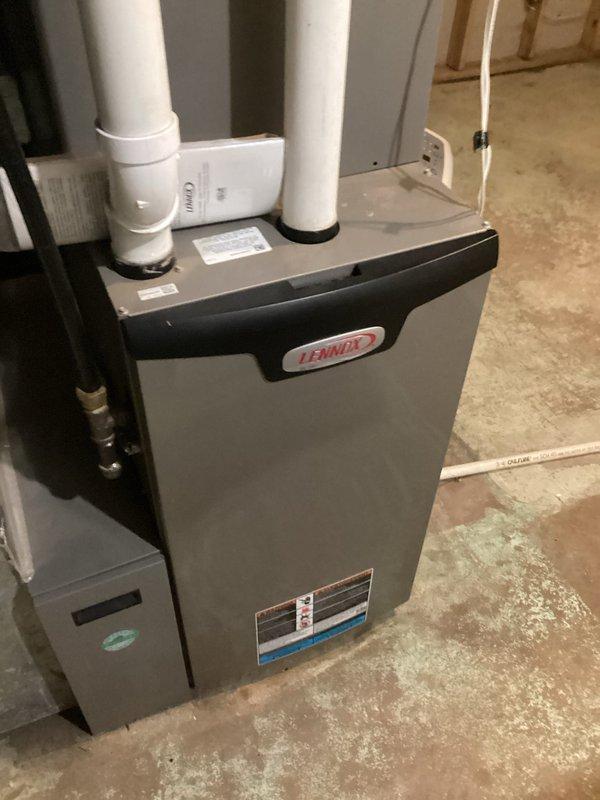 Responded to follow-up service call for leaking downstairs toilet with leak occurring between tank and bowl. Upon inspection, identified multiple deficiencies with existing toilet fixture that would require extensive repairs. Presented repair options versus replacement to customer. Customer elected to proceed with complete toilet replacement. Removed old toilet fixture and installed new white porcelain gravity-flush toilet with standard left-side flush lever. Ensured proper sealing between tank and bowl, verified secure mounting to floor flange, and tested for leaks. Confirmed proper flush operation and water fill cycle upon completion.