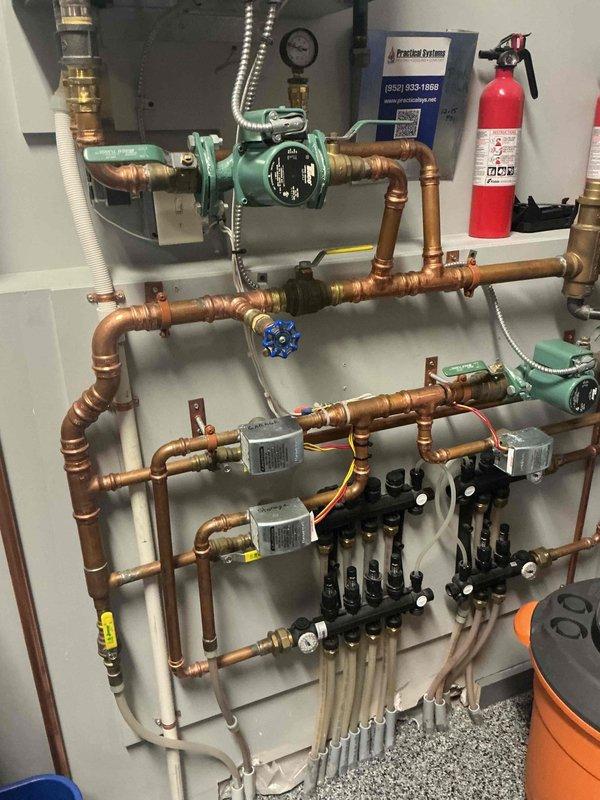 Responded to no heat call on 11-year-old NTI boiler with indoor temperature at 63 degrees. Upon arrival, found boiler operational but not providing heat to any zones in the residence. Conducted diagnostic evaluation and observed multiple sporadic error codes displaying on control board with no consistent pattern. Performed several power cycle attempts to isolate issue, during which boiler repeatedly attempted to reload system parameters without success. System intermittently displayed disconnected status between cycles, confirming irregular communication between control board and system components. Based on erratic code behavior, inconsistent parameter loading, and random disconnection events, diagnosed control board failure as root cause of no heat condition. Submitted parts request form for replacement control board pricing and availability. Coordinated with service advisor to schedule follow-up appointment for board replacement upon customer approval. Boiler remains non-operational 