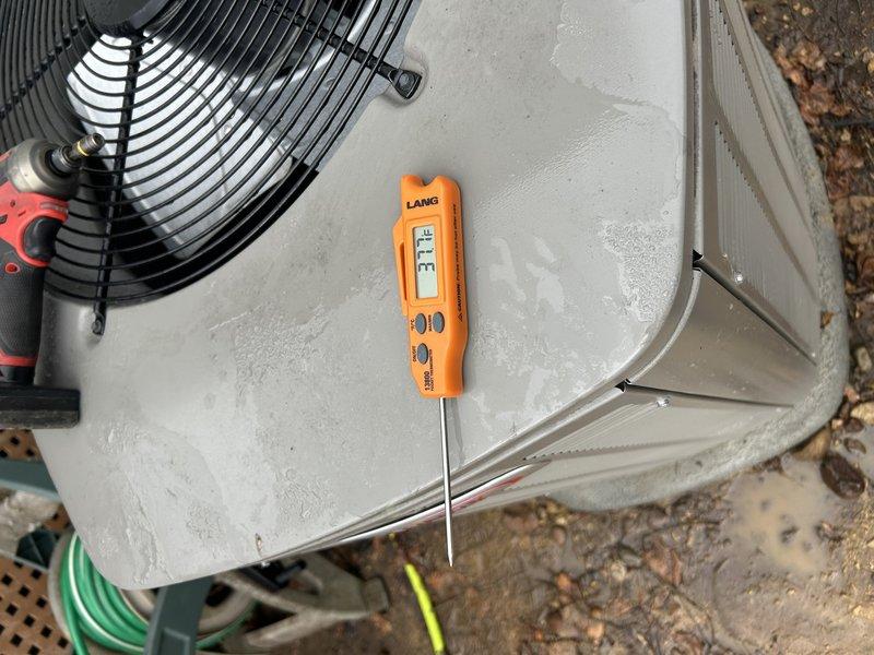Completed annual AC tune-up on 2-year-old Lennox system as part of Family Rewards membership maintenance agreement. Performed comprehensive system evaluation including operational testing of air conditioner using charging jacket due to ambient temperature of 37°F, verified condensate drain line was clear and flowing properly, inspected and assessed air filter condition with replacement filter provided for future use, conducted exterior condenser unit inspection with full coil cleaning to remove debris and restore optimal airflow, and measured electrical amperage draw at 33.1 amps confirming proper compressor operation. All components tested within normal operating parameters with no deficiencies noted; system operating as designed.
