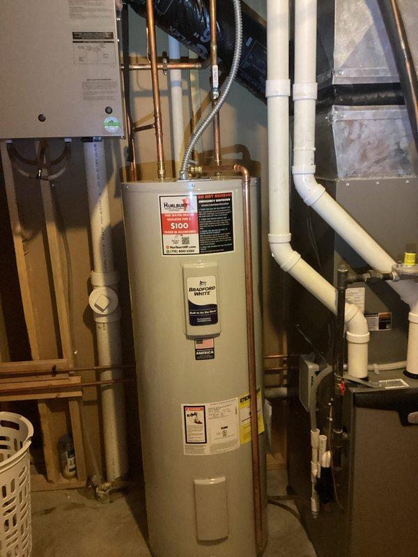 Installed new 50-gallon electric water heater in residential basement mechanical room. Completed all necessary electrical and plumbing connections, including copper supply lines and appropriate safety components, ensuring proper integration with existing HVAC and utility systems.