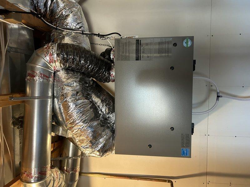Responded to service call to restore furnace blower speeds to factory specifications of 350-450 CFM. Blower speeds had been previously increased during an IAQ system installation at customer's request, but airflow adjustment proved unsatisfactory for comfort needs. Accessed air handler unit in attic space, reviewed manufacturer settings, and reprogrammed blower motor to default speed parameters. Verified proper CFM output and system operation upon completion. This complementary visit corrected the unauthorized modification made during previous installation work.
