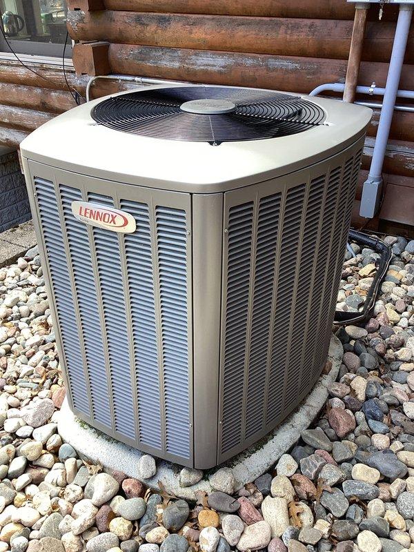 Replaced damaged condenser grille and top cover on Lennox outdoor AC unit. Removed bent components and installed new grille and top cover, ensuring proper alignment and secure fitment. Unit restored to proper operational condition with all connections verified and system tested for normal function.