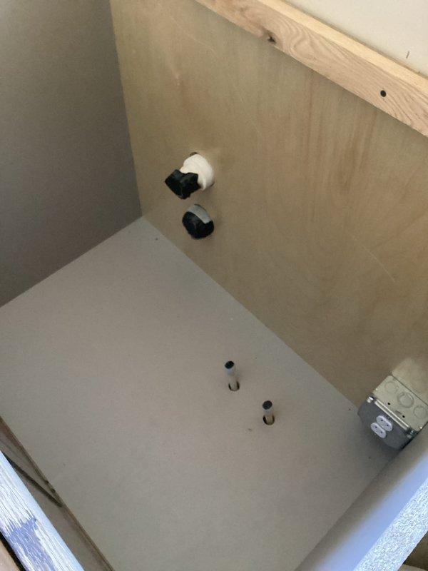 Responded to leaking Roman tub faucet with no accessible shut-off valve. Implemented temporary repair using vise grip and bungee cord to control water flow, as shutting off main water supply to entire home was the only alternative. Customer planning tub removal for upcoming remodel and declined line capping service. Provided estimate for kitchen plumbing finish work in renovation area.