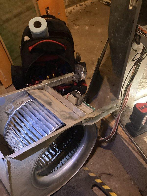 Responded to no heat call on Comfortmaker furnace system. Upon arrival, found unit cycling on high limit safety. Discovered severely restricted airflow caused by heavily soiled air filter and nearly completely blocked secondary heat exchanger. Removed and replaced dirty filter, then removed blower assembly to access and thoroughly clean secondary heat exchanger. After cleaning, tested system operation and confirmed proper heating cycle with no limit trips and correct blower operation. Educated occupant on importance of regular filter maintenance to prevent future heat exchanger blockage, particularly with pets in home.