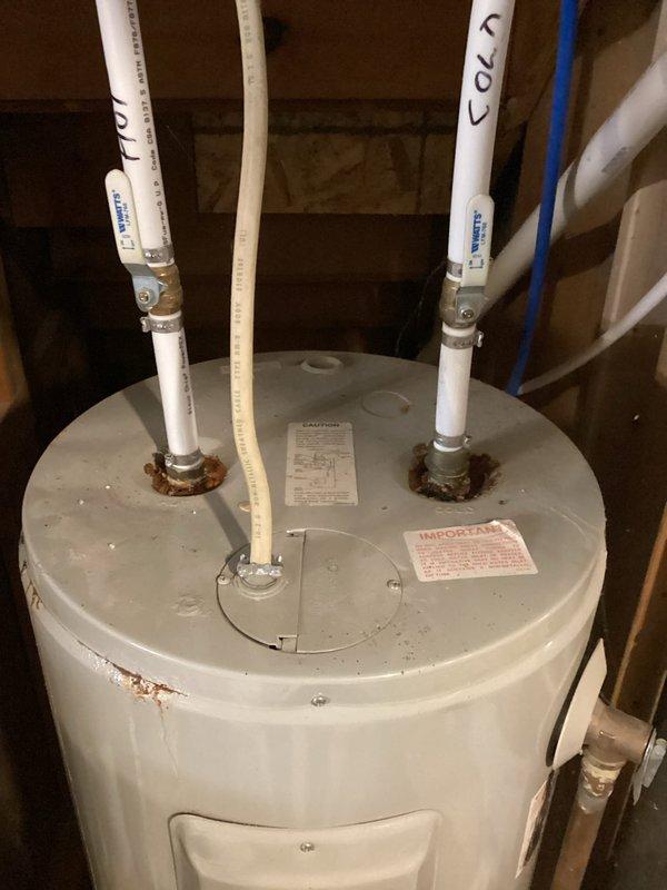 Responded to a leaking water heater emergency and removed the failed unit. Installed a new 50-gallon electric water heater with expansion tank in the residential utility space, connecting all supply lines using PEX plumbing with proper hot and cold water configurations. Completed full system testing to verify proper heating operation and confirmed no leaks at connections or tank fittings.