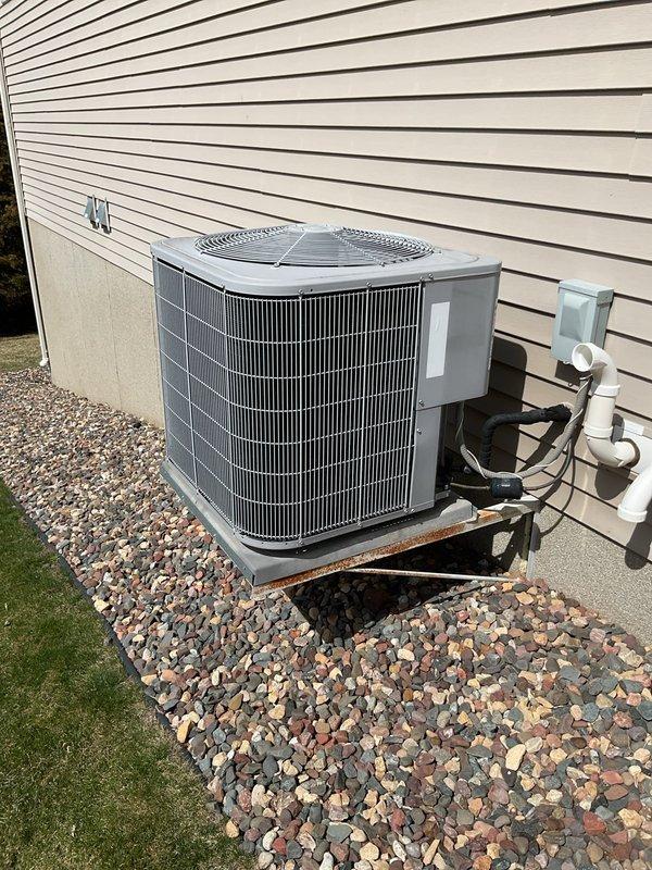 Performed comprehensive HVAC system inspection on 11-year-old Carrier heating and cooling system. Diagnosed thermostat failure preventing furnace operation and system activation. Completed full air conditioning tune-up with no operational issues identified. Inspected zoning system and identified failed basement zone damper stuck in closed position. Provided estimate for replacement of both older-style zone dampers to restore proper airflow distribution throughout home. Ordered replacement dampers for installation. Verified outdoor condenser unit operating within normal parameters with no refrigerant leaks or electrical concerns. System ready for damper replacement upon parts arrival.