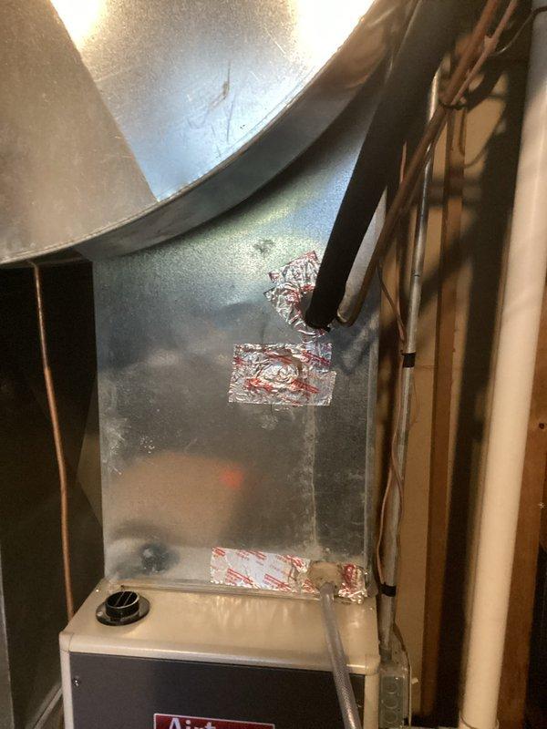 Replaced a damaged evaporator coil (up to 3 ton capacity) due to a cracked drain pan. Removed the failed coil, brazed in the new warranty replacement unit, and reconnected the plenum. Pulled a vacuum on the lineset to ensure system integrity, charged the system with R-410A refrigerant to manufacturer specifications, and reconnected the condensate drain line. Verified proper system operation with outdoor ambient temperature at 37°F. All components functioning within normal parameters upon completion.
