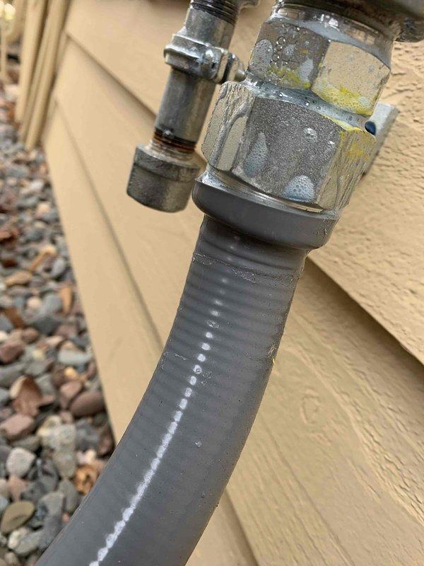 Responded to gas odor complaint near exterior generator installation. Upon arrival, utility company had already identified two gas leaks on supply lines. Removed and replaced defective fitting at tee connection, eliminating first leak. Tightened loose gas connection at generator inlet to resolve second leak. Performed comprehensive leak verification using combustible gas meter and soap solution on all connections. Confirmed system returned to safe operating condition with no detectable leaks present.