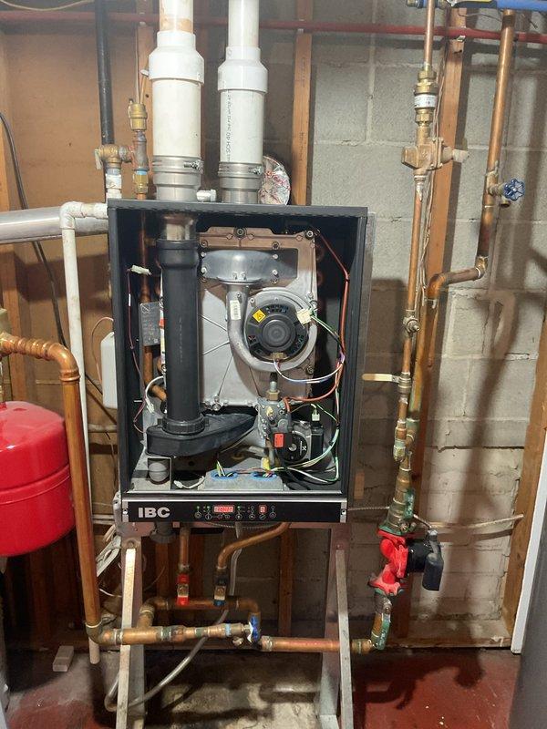 Replaced faulty return water temperature sensor on IBC wall-mounted boiler per approved estimate. Installed new sensor, tested system operation, and verified proper functionality of the hydronic heating system.