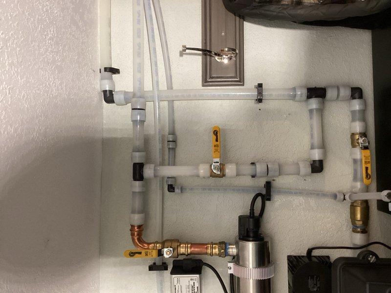 Responded to leaking UV light unit on recently installed water treatment system. Upon arrival, confirmed UV light was actively dripping from both ends. Removed defective UV unit by cutting out existing installation. Installed new UV light unit and secured all connections to eliminate leakage. Tested system operation and verified no further dripping from replacement unit.